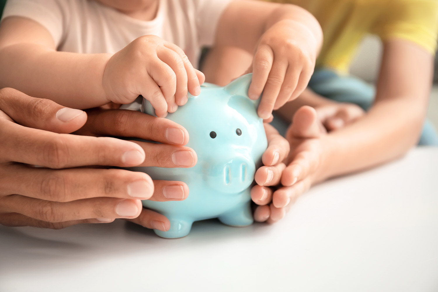 child with piggy bank